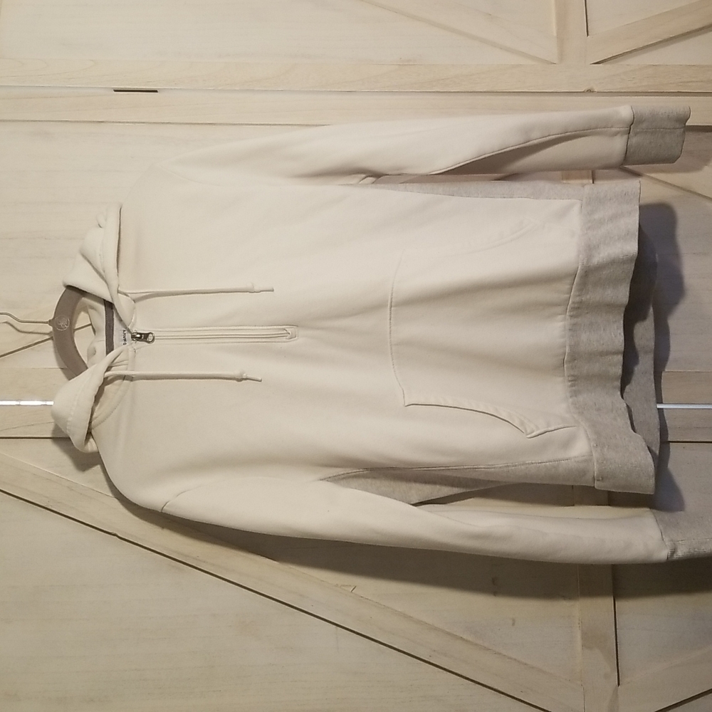 White, half-zip hoodie.
